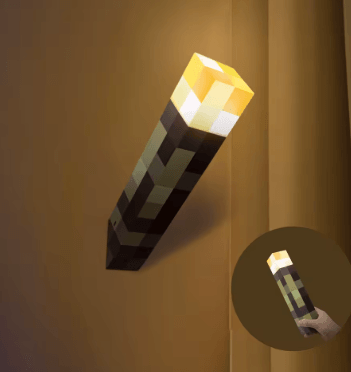Torcia pixel montata a parete, fiamma accesa